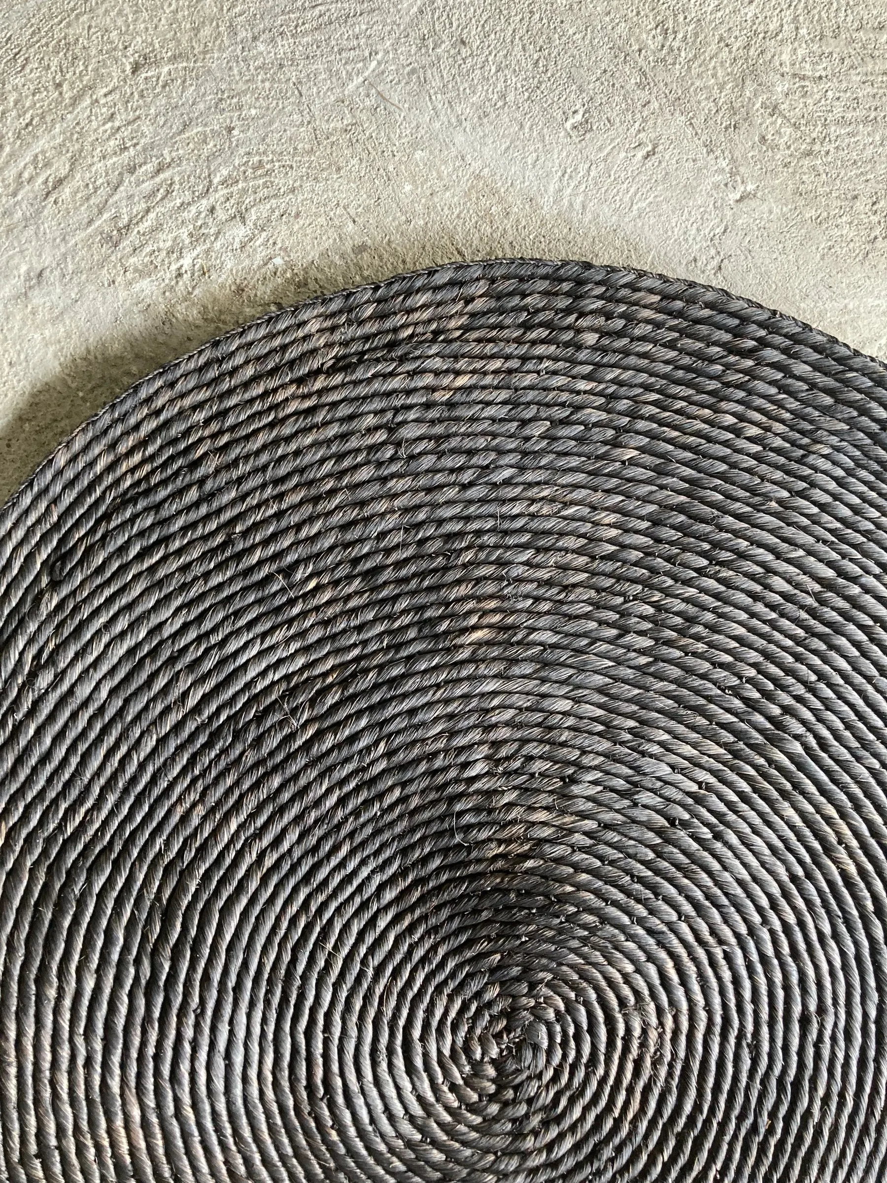 Black coiled round abaca rug